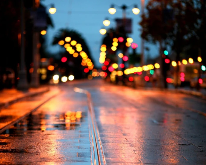 gray concrete road asphalt during night bokeh lights