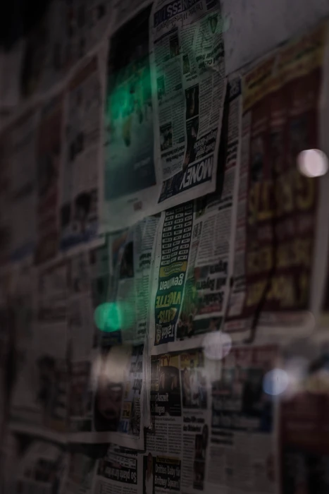 news paper article newspaper sheets on wall light moody dark 2k 4k