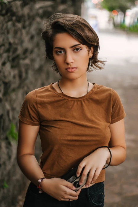 Photo of Girl Wearing Brown Shirt attractive beautiful beauty 2k