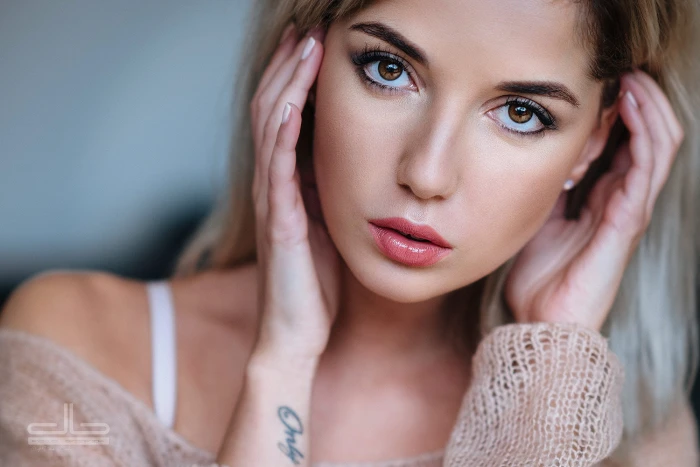 women blonde face brown eyes hands in hair portrait tanned 2k