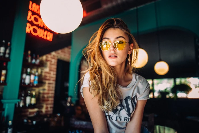 women s gray and black printed crew neck t shirt photo of woman wearing white 2k