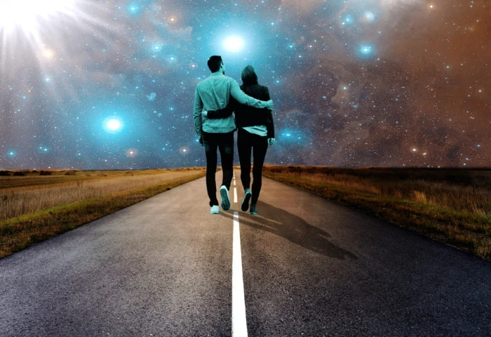 man and woman holding each other s arm walking towards road asphalt 2k