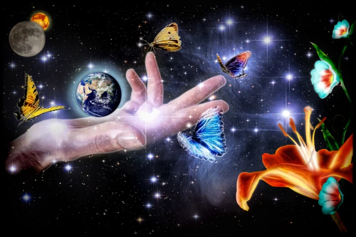 planet earth on glowing hand with moon and butterflies artwork 2k