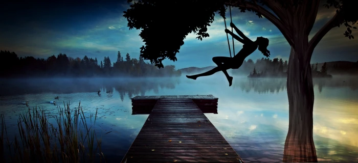 silhouette of a woman riding on swing at night girl lake web 2k 4k