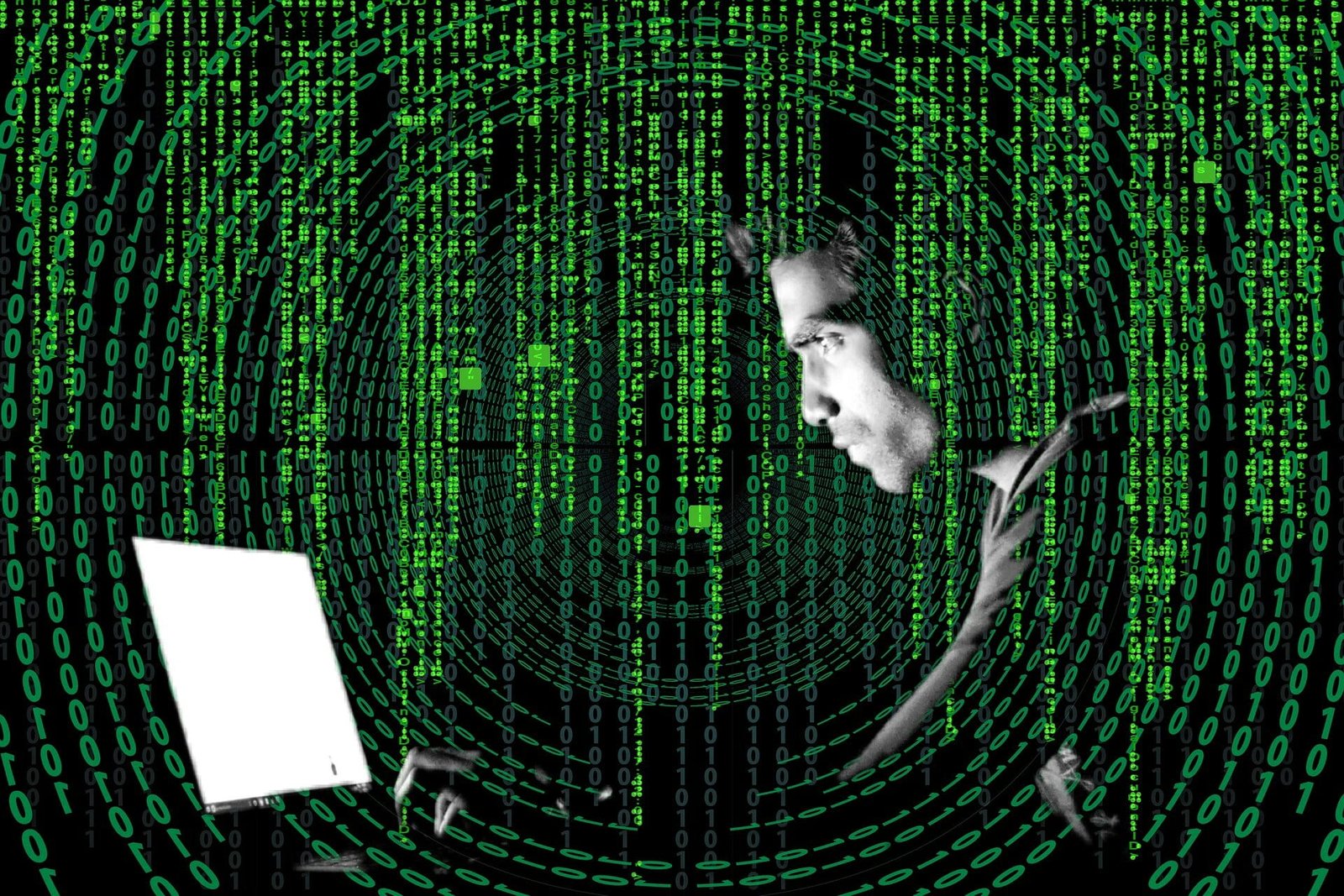 man in front of computer security cryptocurrency bitcoin hacking