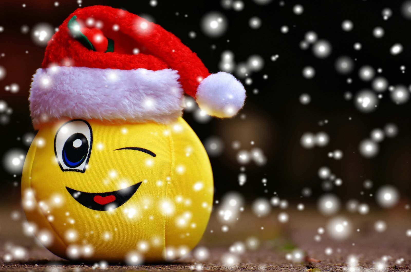 yellow emoji plush toy wearing red Santa Claus hat christmas 2k 4k 5k