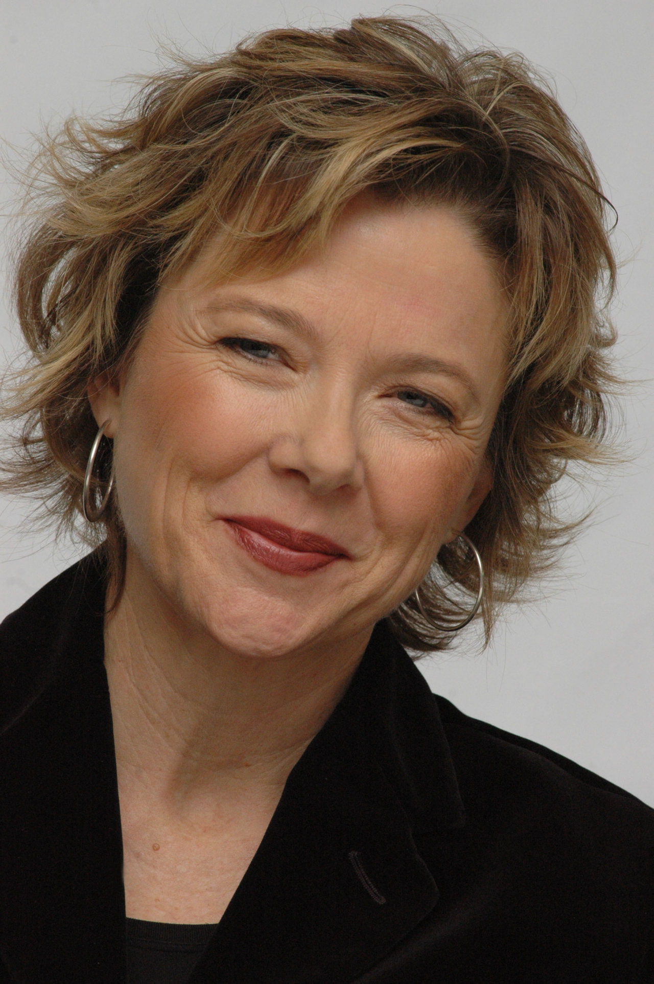 Annette Bening actress brunette green eyes hoop earrings