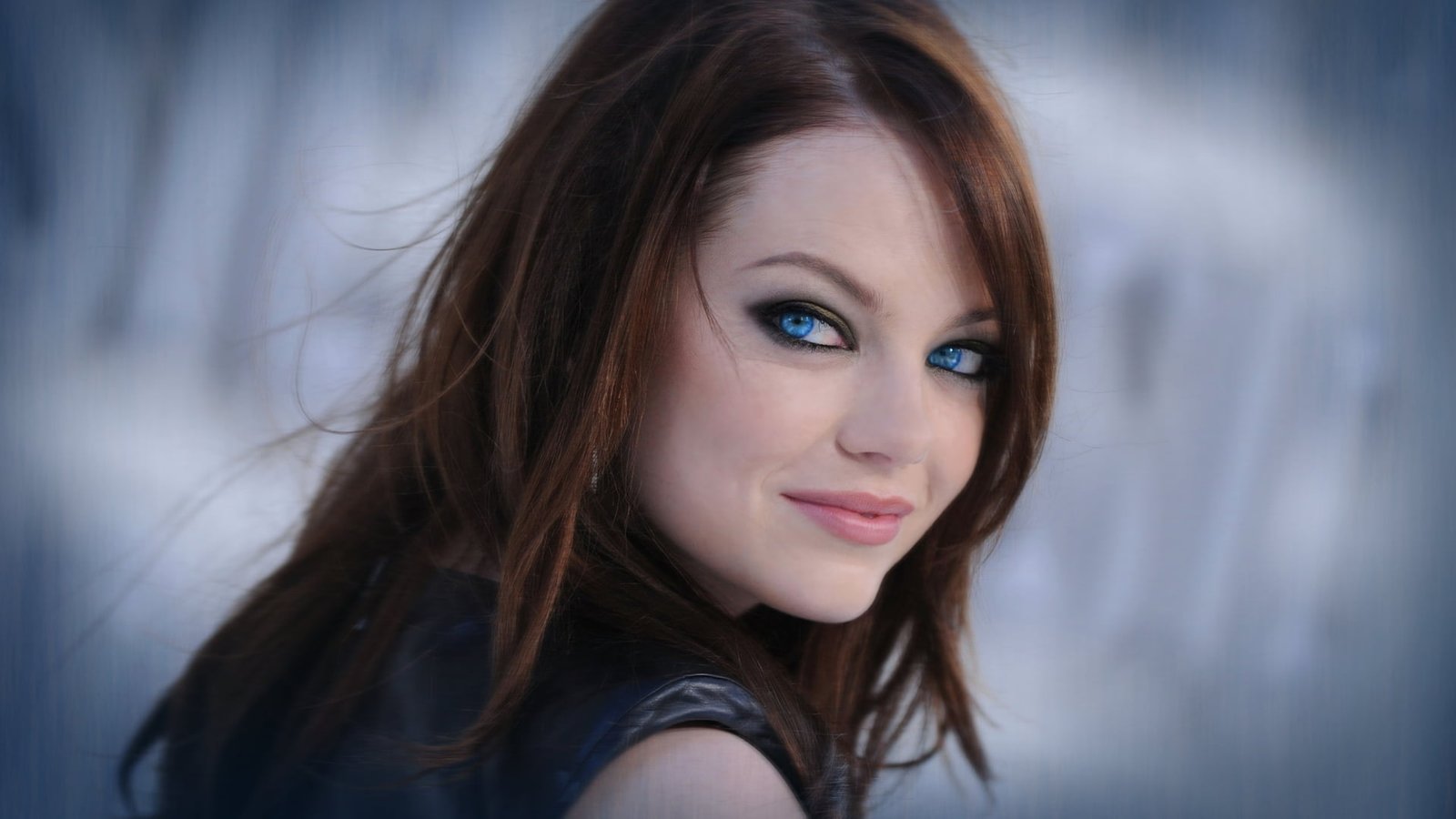 women's black top Emma Stone redhead smiling looking at viewer