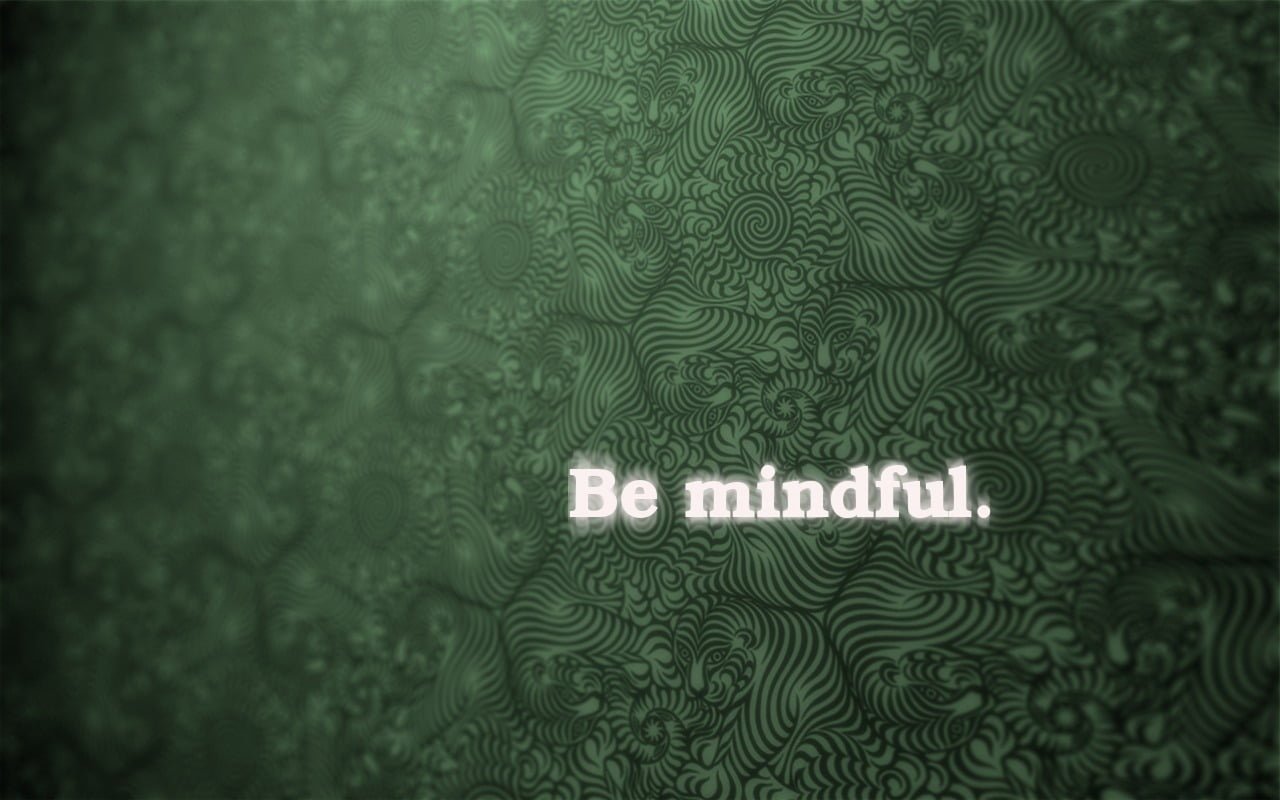 Be mindful text with green background abstract motivational