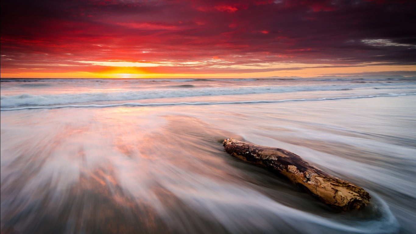 brown and white wooden board beach sky horizon sunset sea