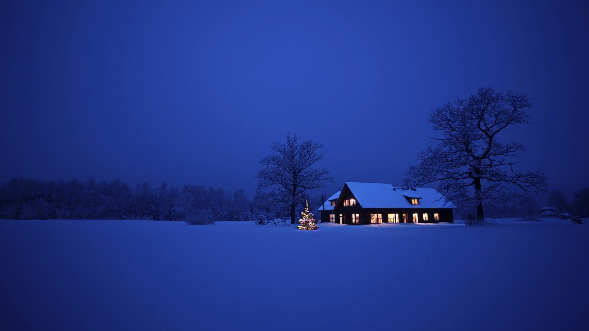 gray house photo of cabin in the middle snow covered field during nighttime 2k