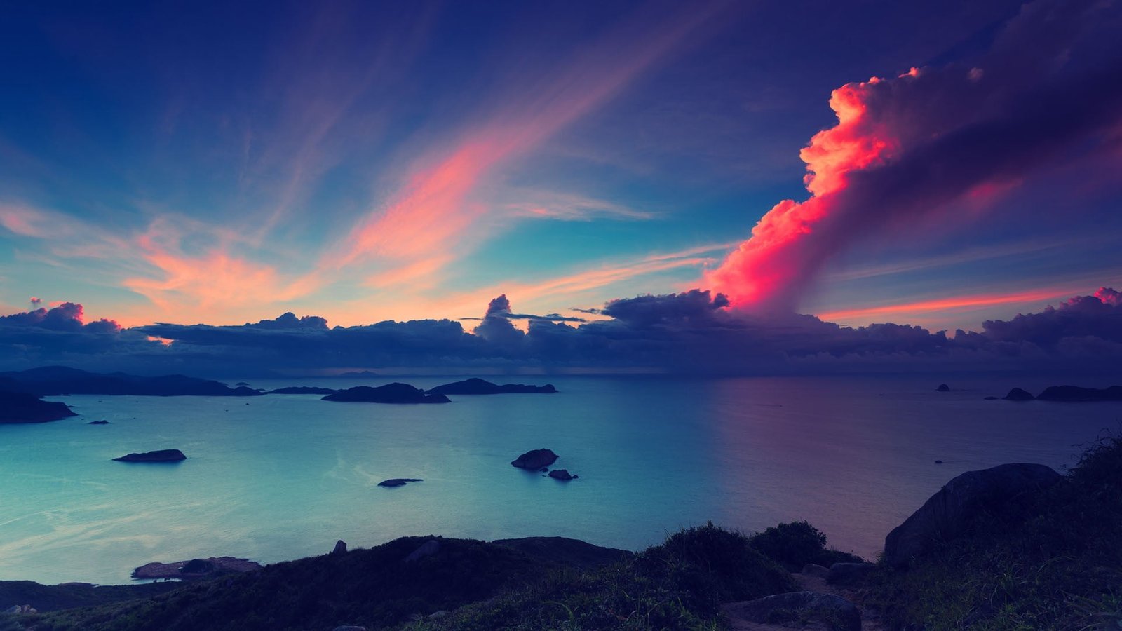 body of water and cumulus clouds calm under orange blue sky 2k