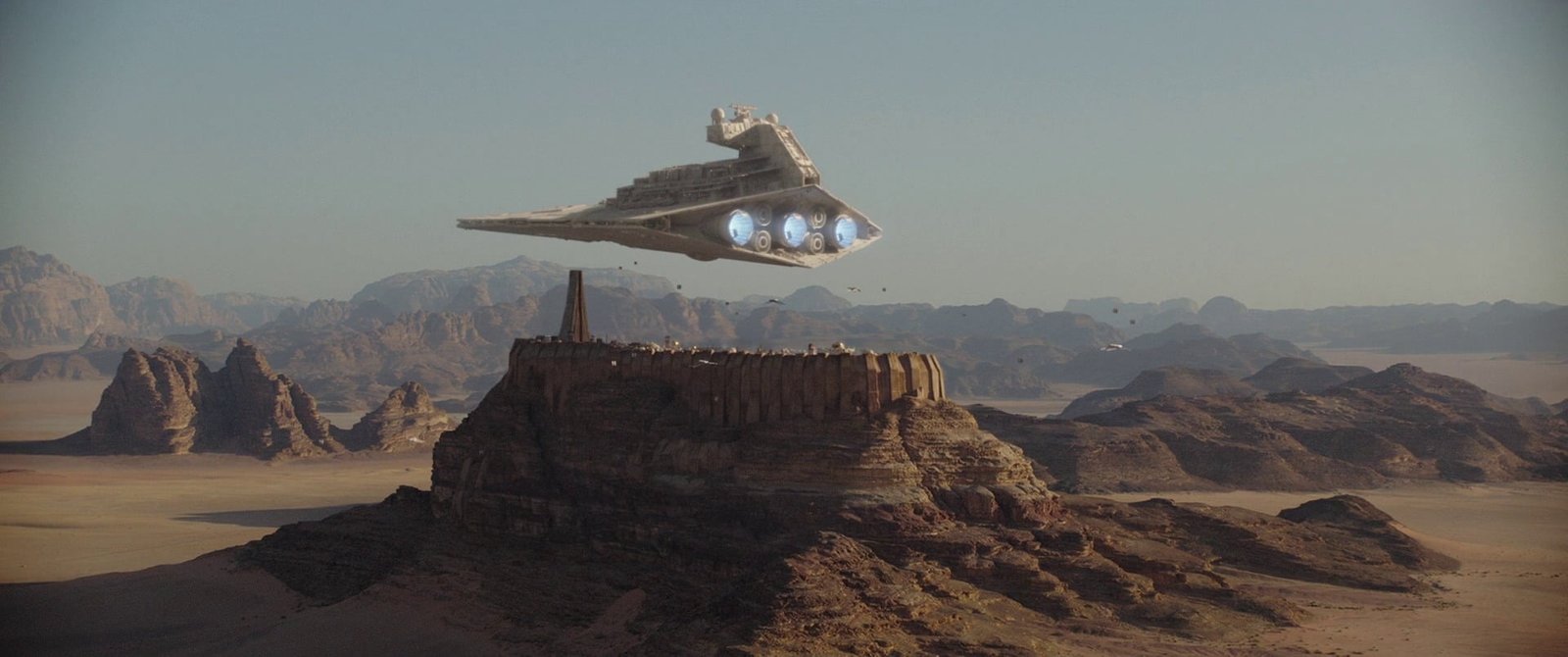 white spaceship hovering above rock formation wallpaper Star Wars 2k