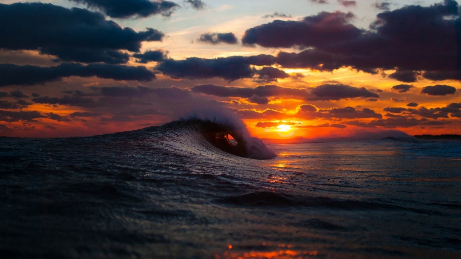 body wave of water sea surf sunset nature beach sky sunlight 2k