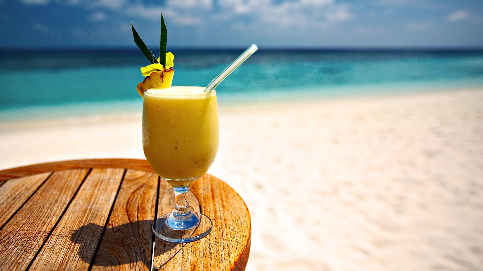 clear footed glass sand sea beach water the ocean cocktail 2k