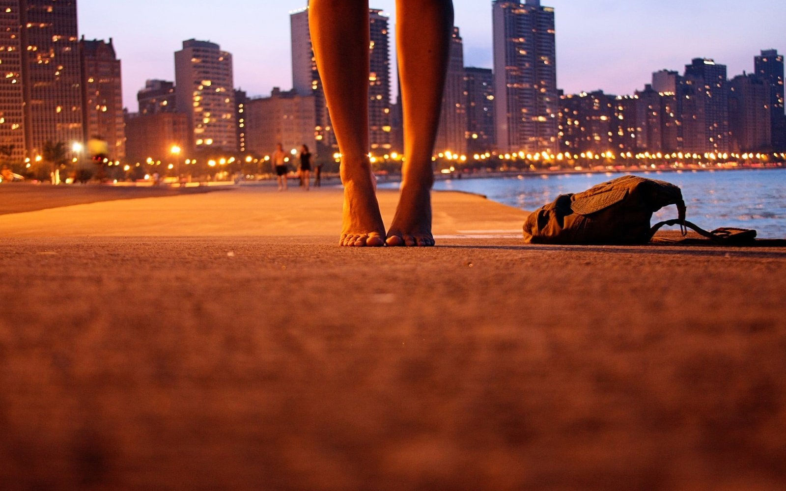 black bag beach feet lights barefoot cityscape outdoors 2k