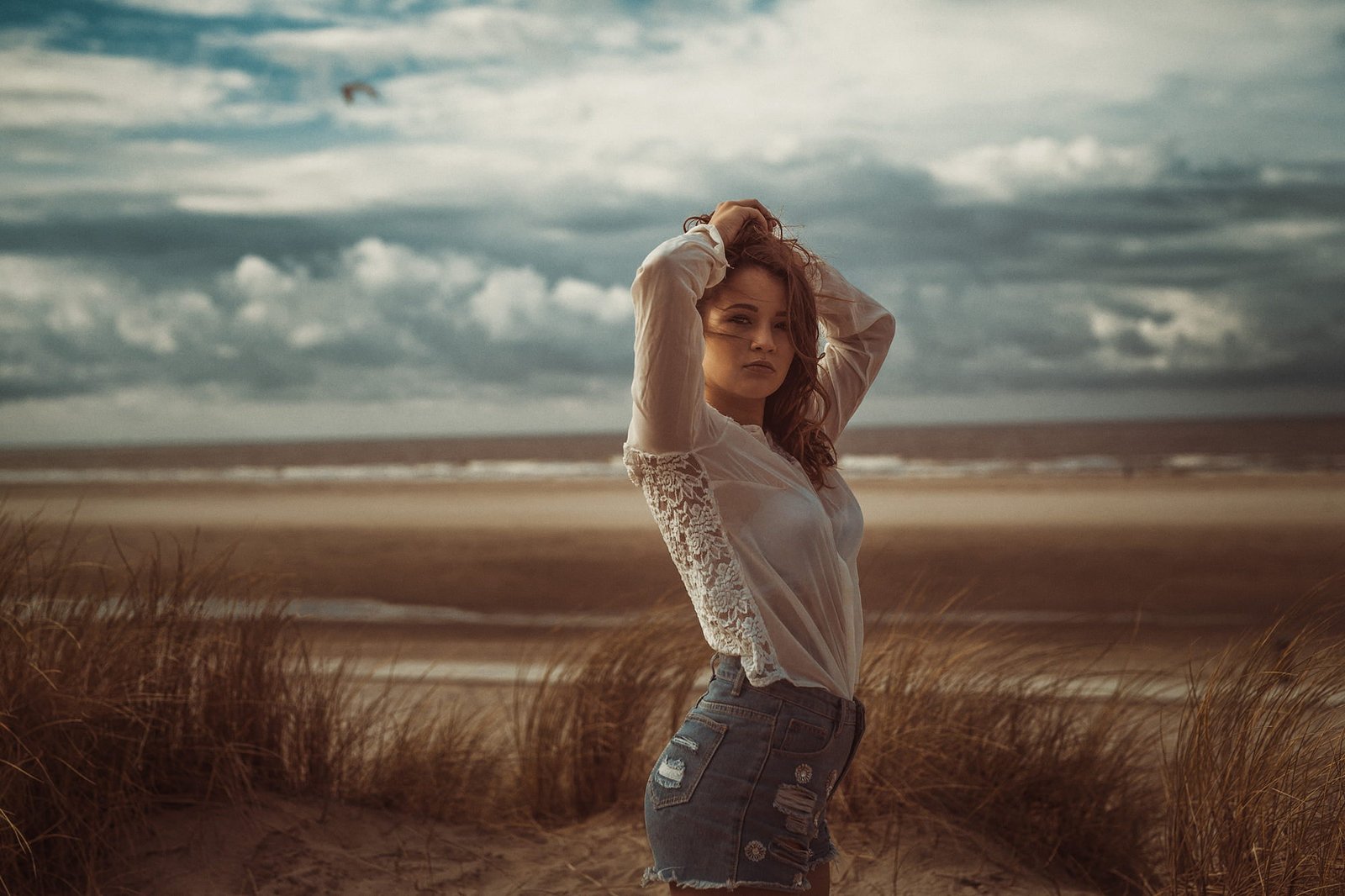 women's white long sleeved shirt brunette women outdoors beach 2k