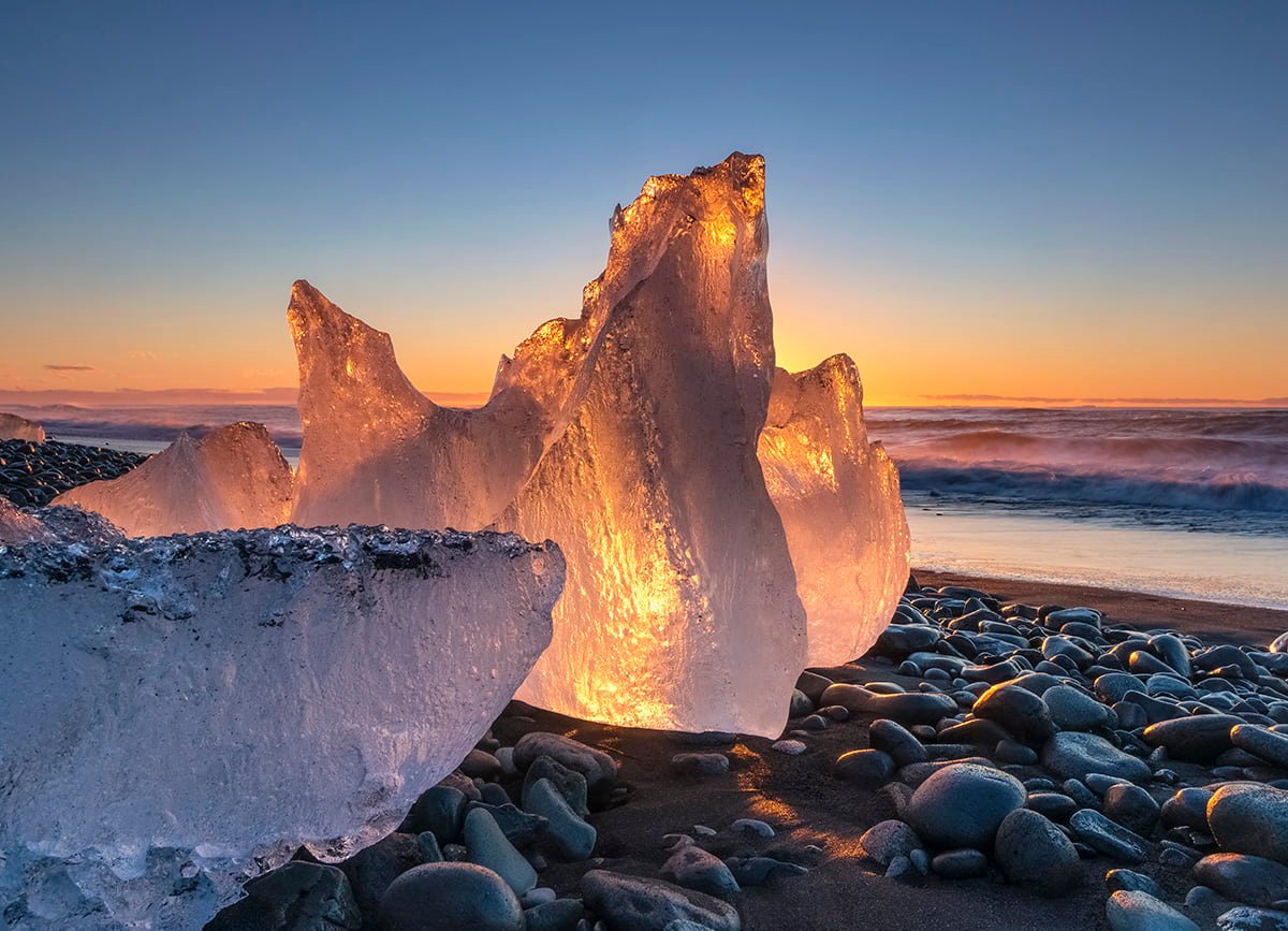 ice formation during sunset in beach Icy Sunrise J kuls rl n Iceland