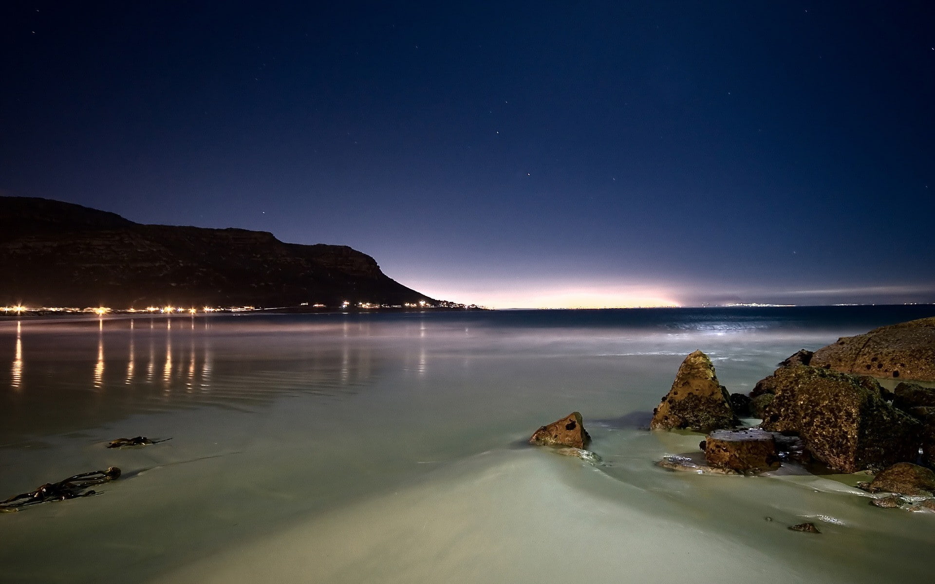 landscape beach rock reflection lights Cape Town sky 2k