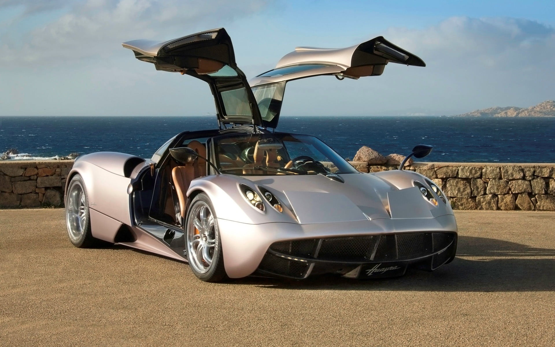 white and black sports car Pagani Huayra mode of transportation 2k