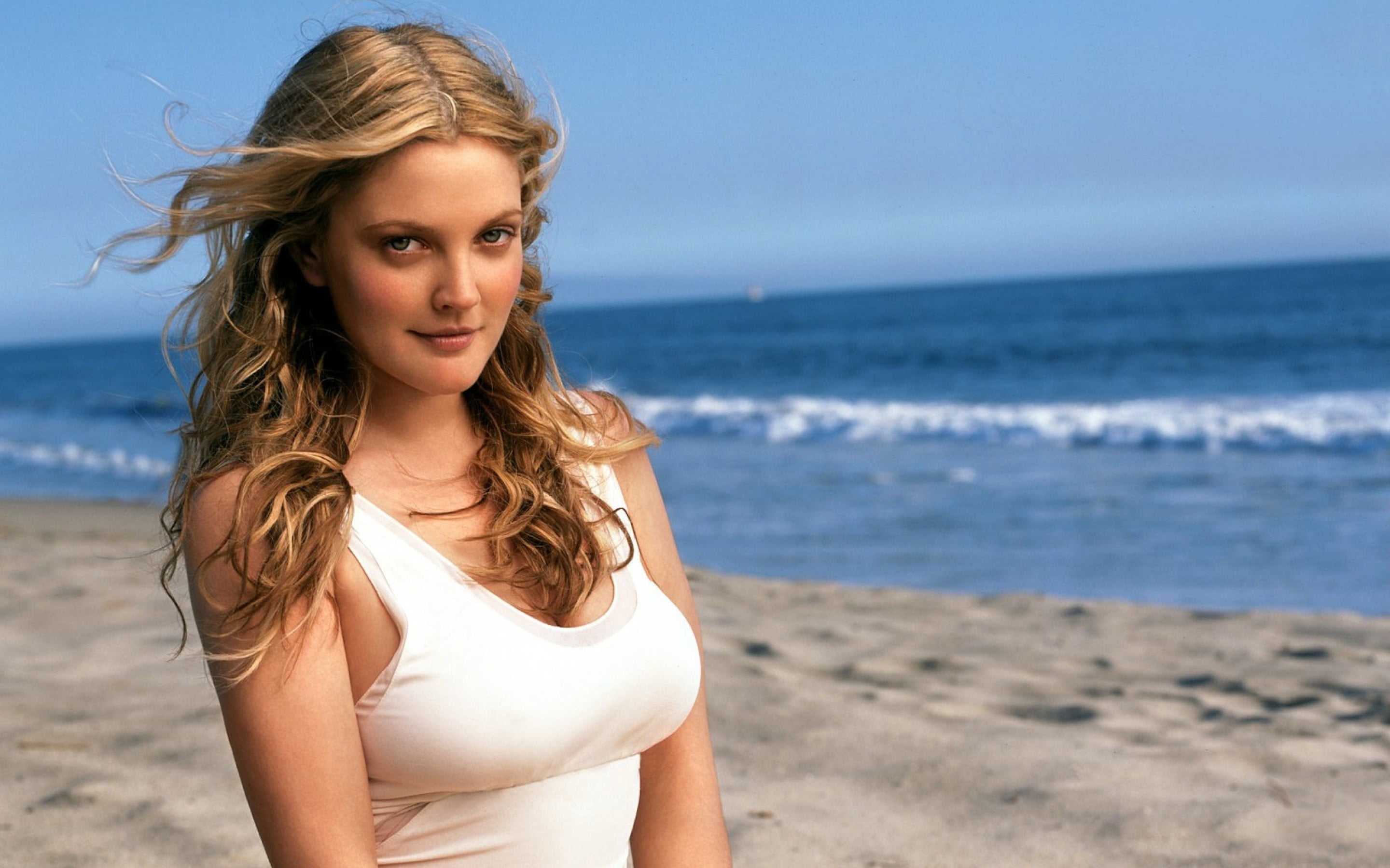 Drew Barrymore women beach sand windy curly hair white tops 2k