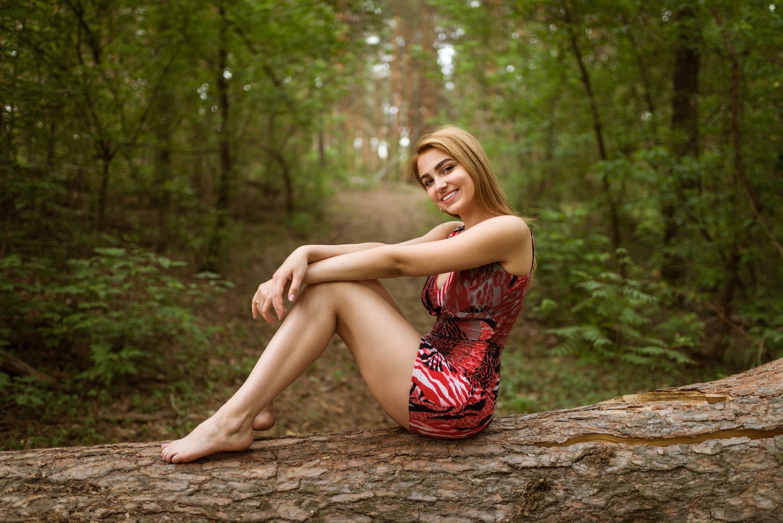 women's red and black mini dress blonde smiling depth of field 2k
