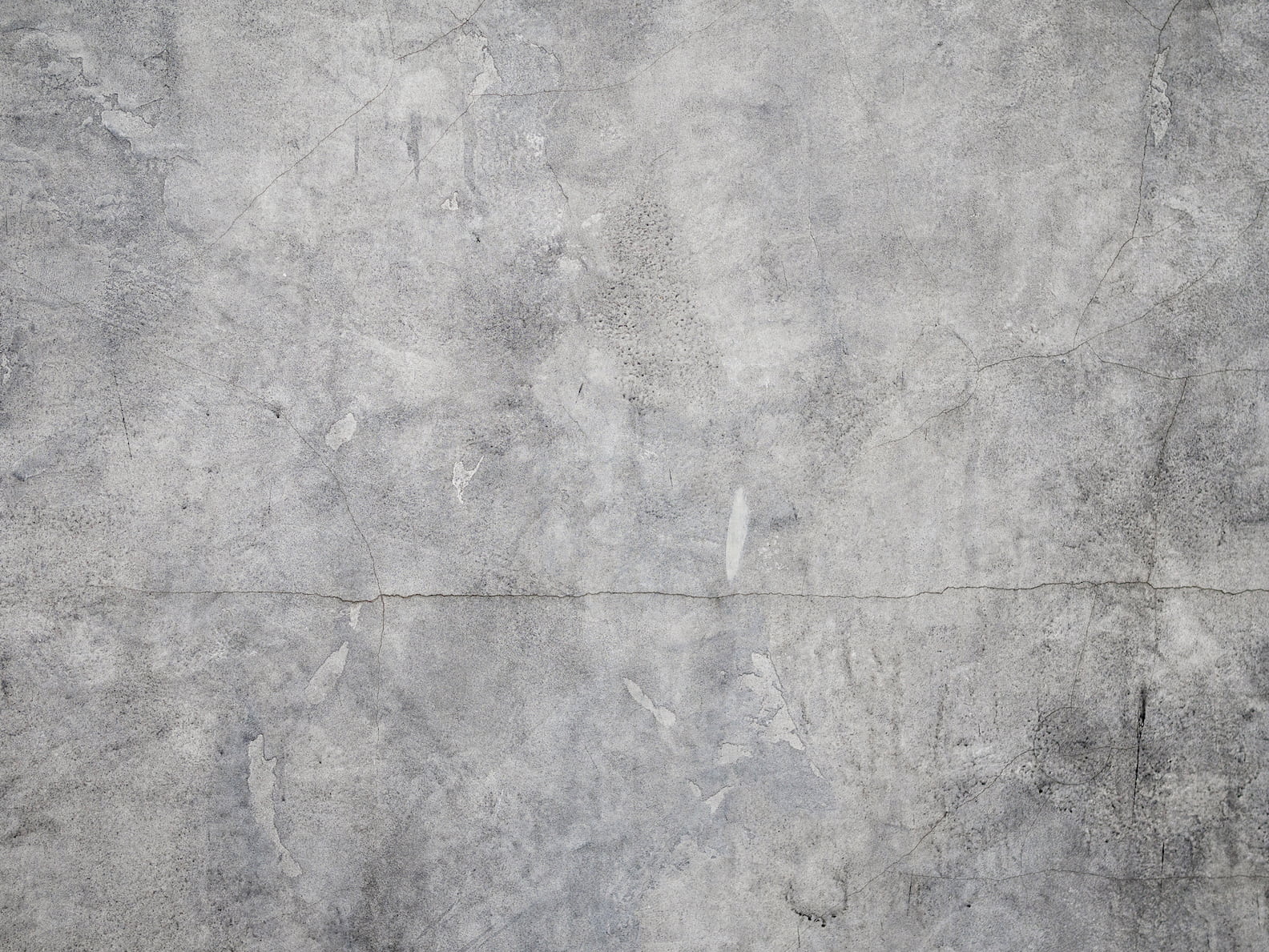 closeup photo of gray concrete wall cracks cement scratches 2k