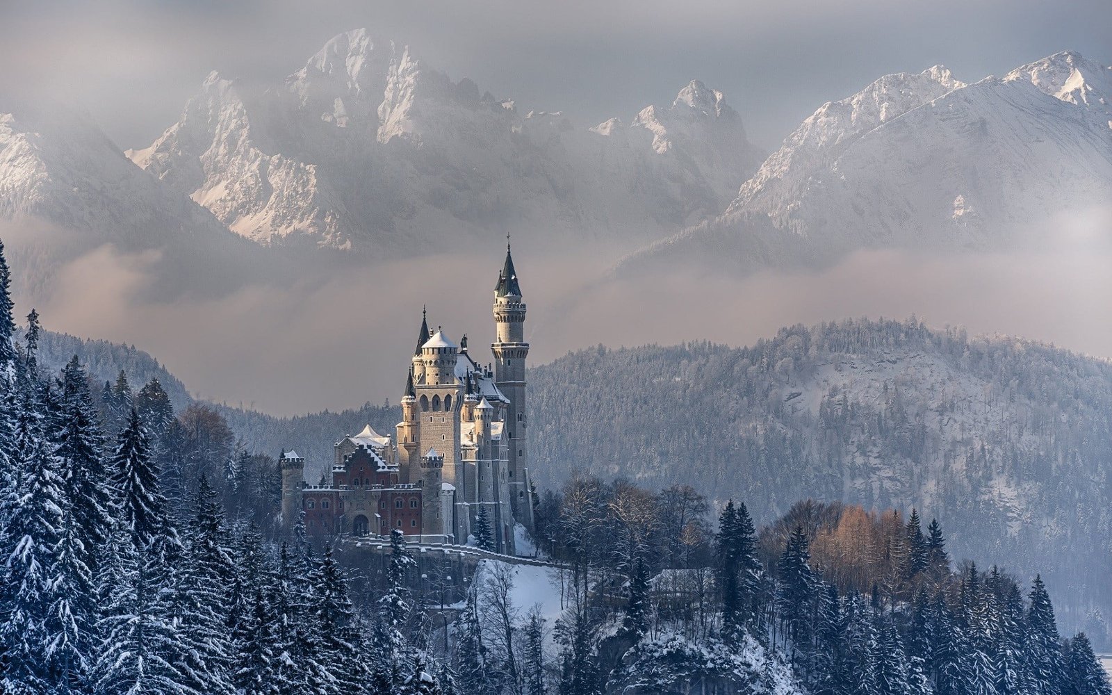 castle beside snow covered mountain nature landscape mountains 2k