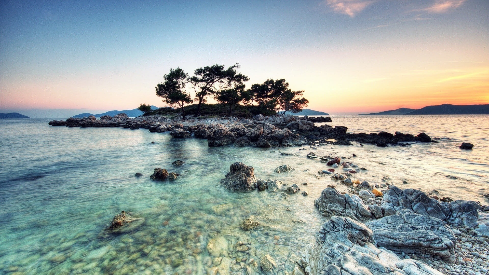 silhouette of trees near island during daytime nature photography 2k