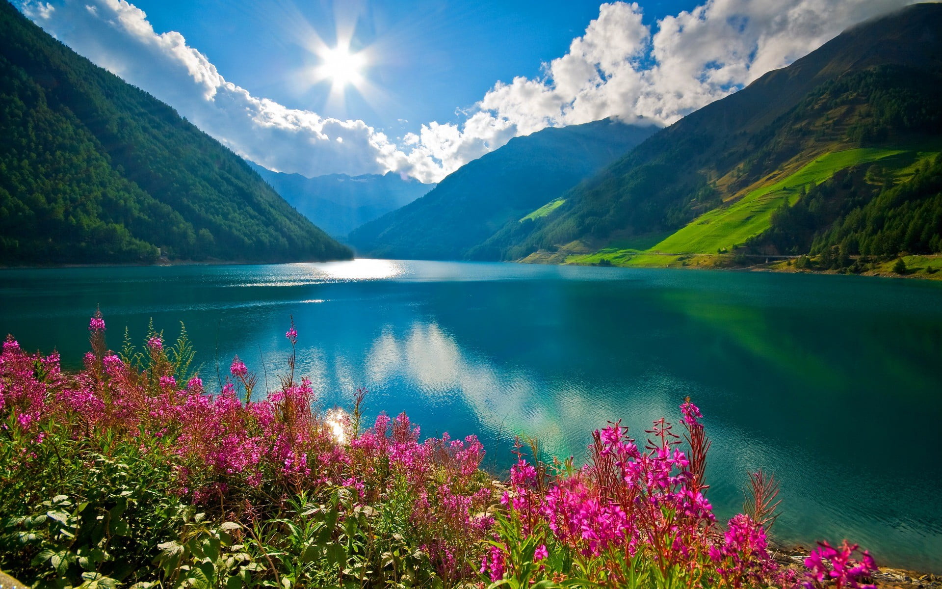 body of water nature landscape mountains river Sun clouds 2k