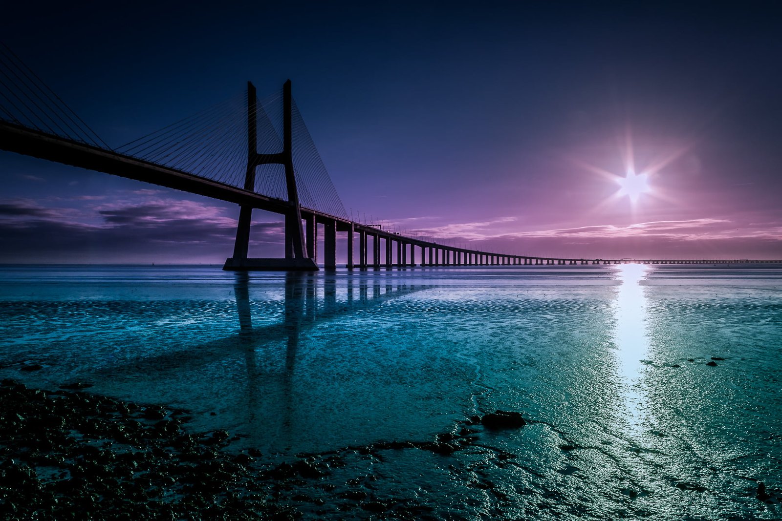 bridge on body of water during day time magic Canon Explore 2k