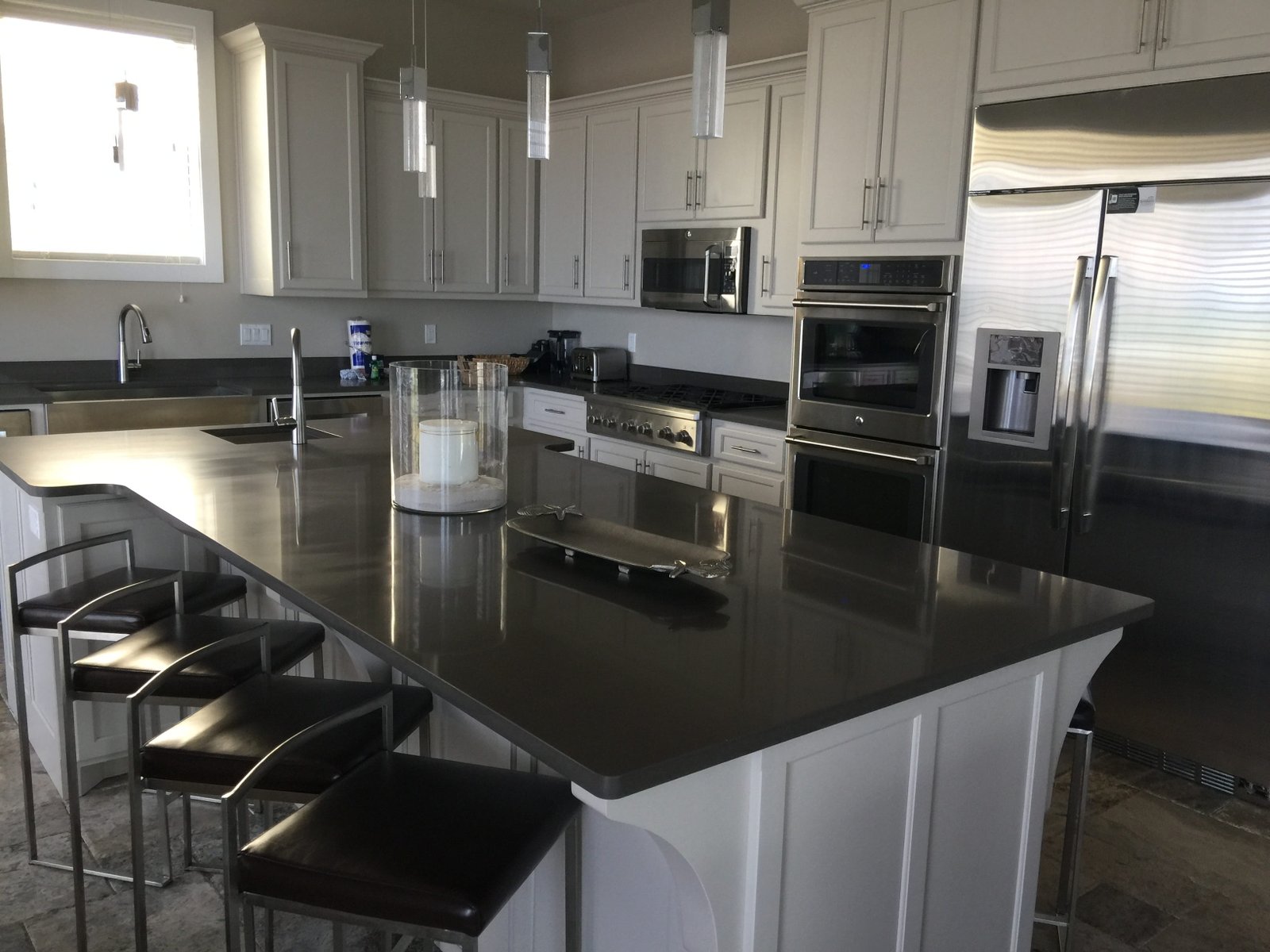 white and gray kitchen area Beach Home Luxury luxury 2k