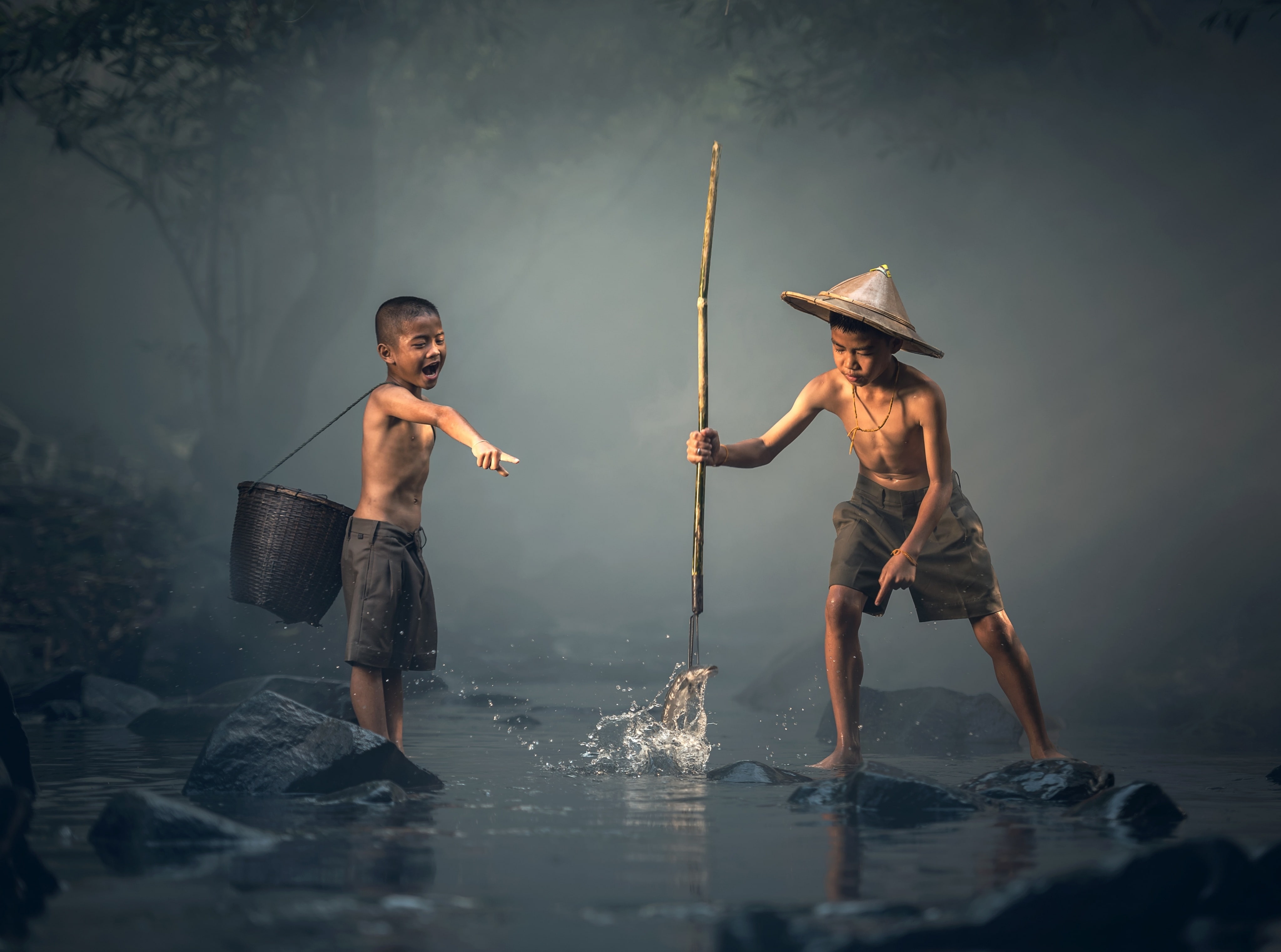 Boy Catching Fish with a Spear boy s black shorts Asia Thailand 2k 4k