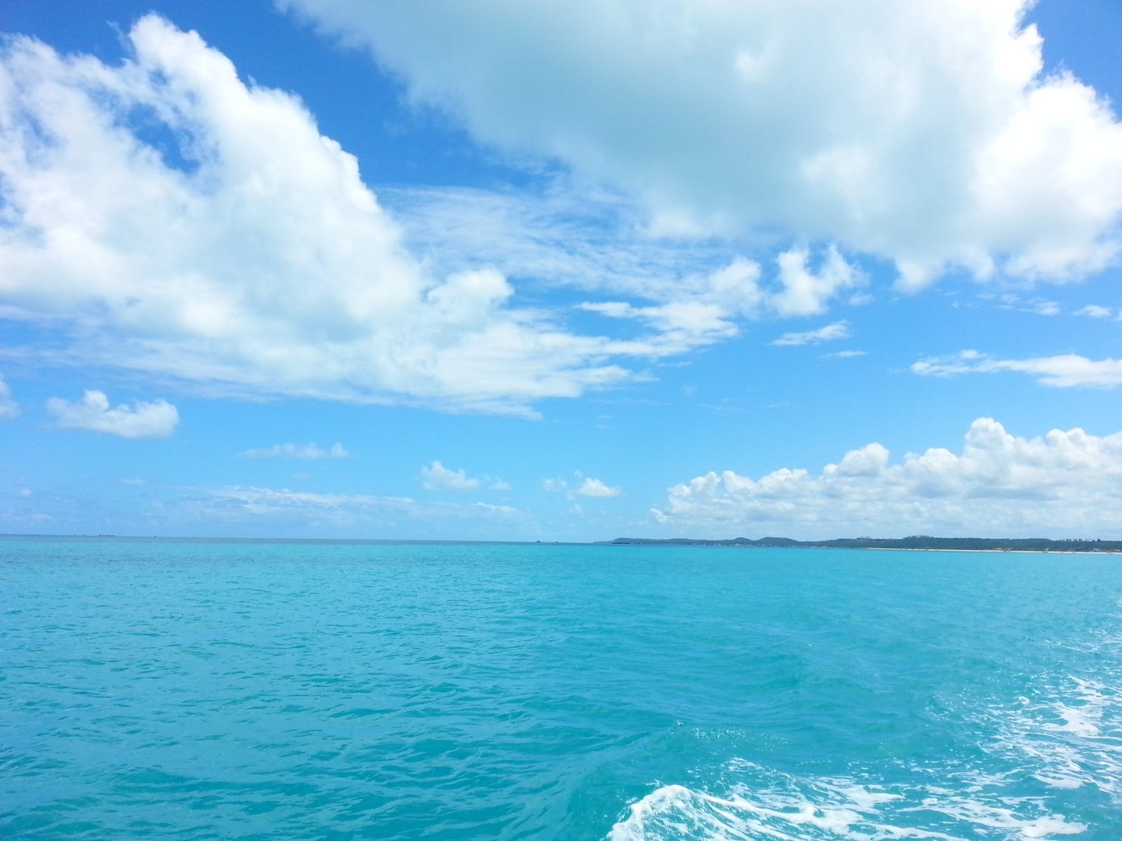 blue sky with white clouds over sea mar beach landscape travel 2k