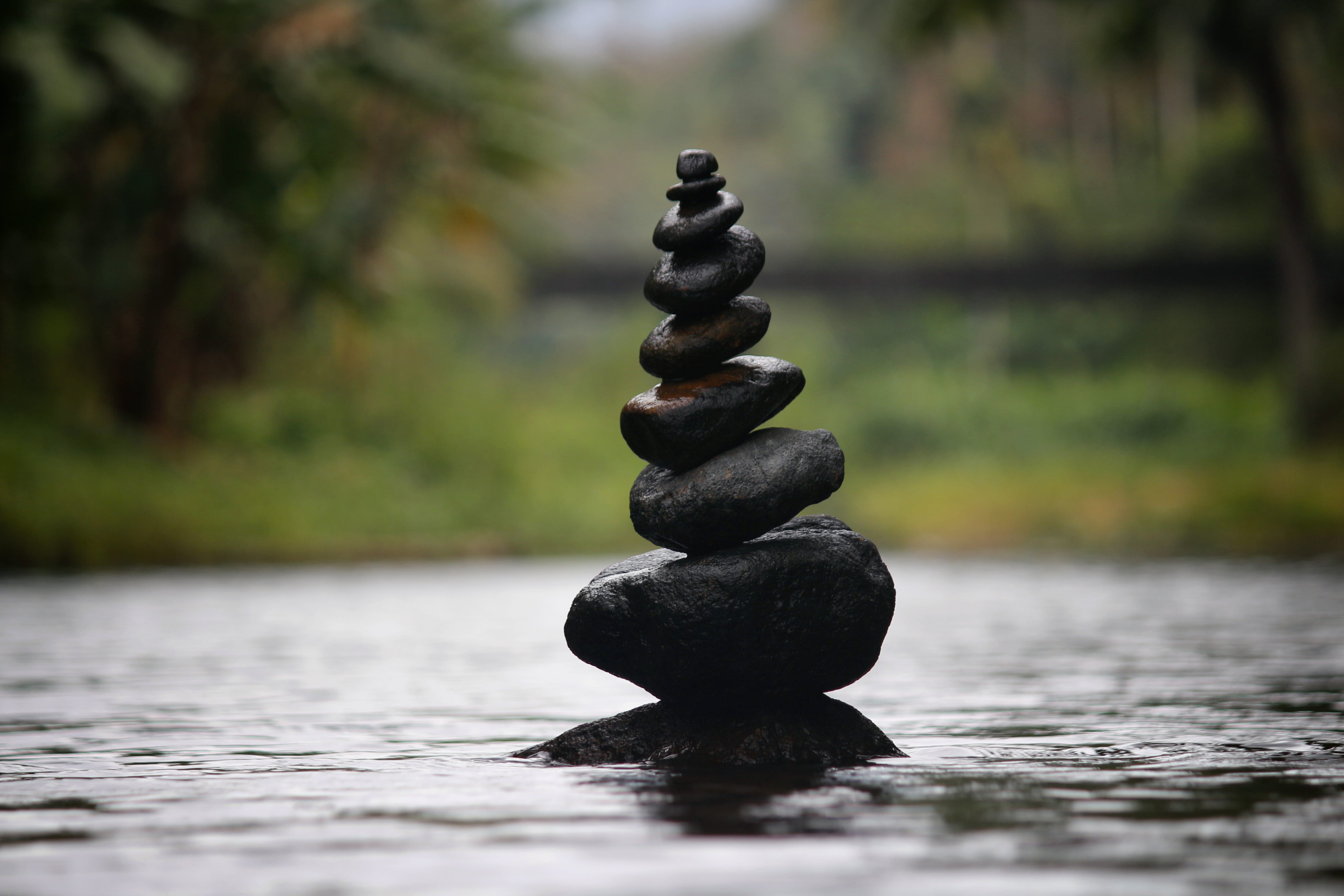 Black Stackable Stone Decor at the Body of Water balance blur 2k 4k 5k