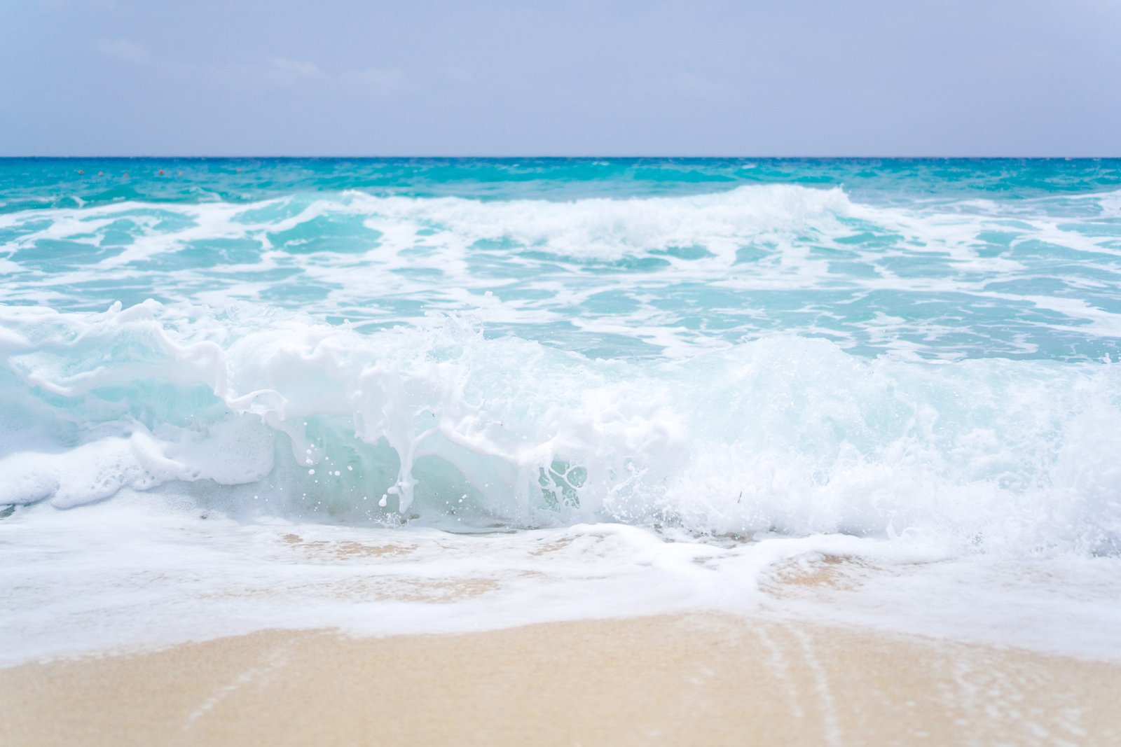 Blue ocean waves on a sandy beach nature coast holidays landscape 2k 4k 5k