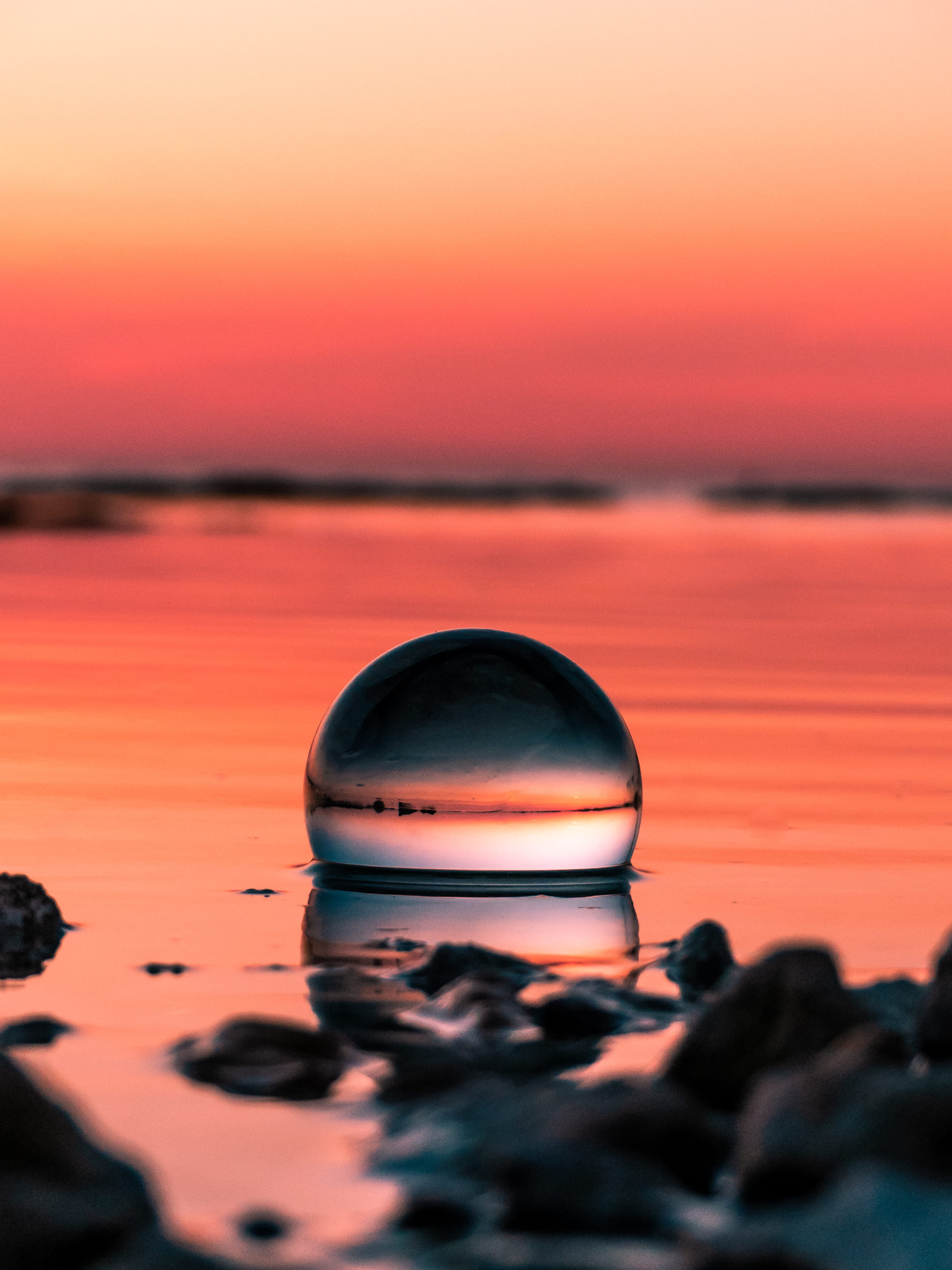 Lensball dawn dusk macro ocean sea sky sunrise sunset 2k
