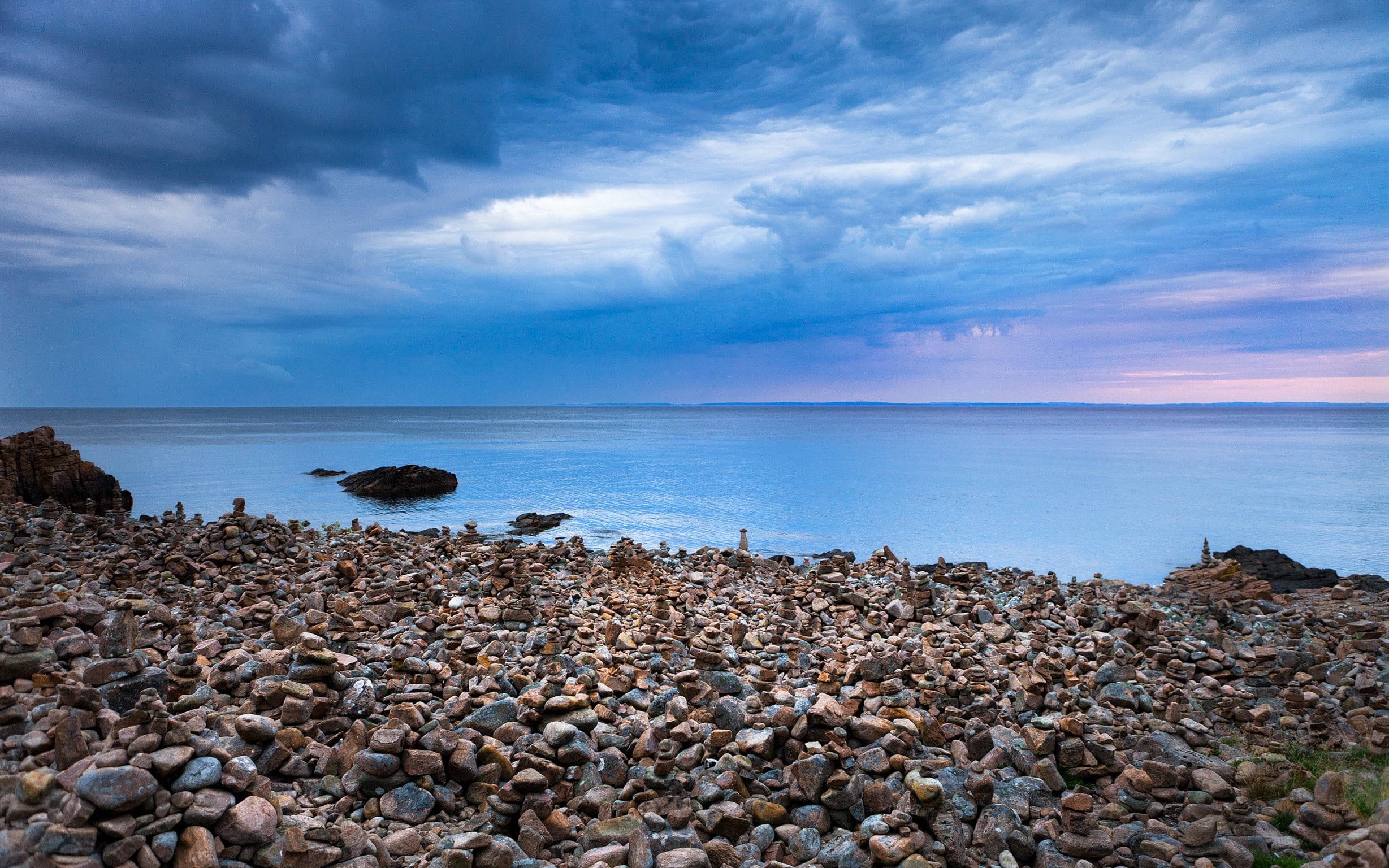 rock Sweden beach landscape sea clouds 2k