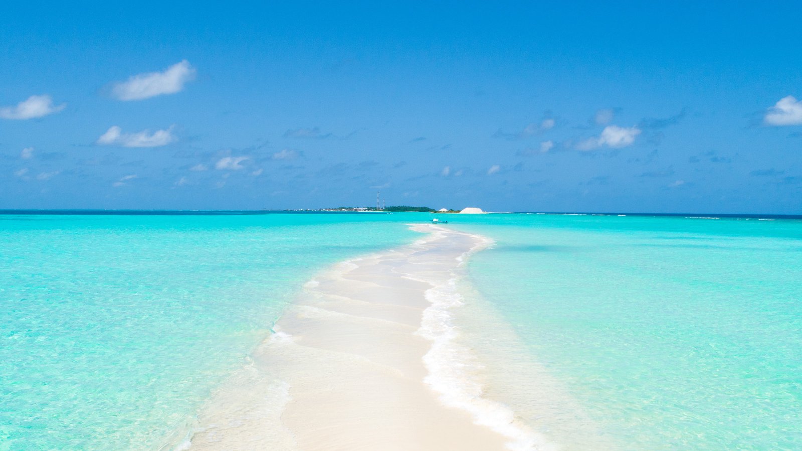 sandbar and sea water on daytime outdoors land nature shoreline 2k 4k