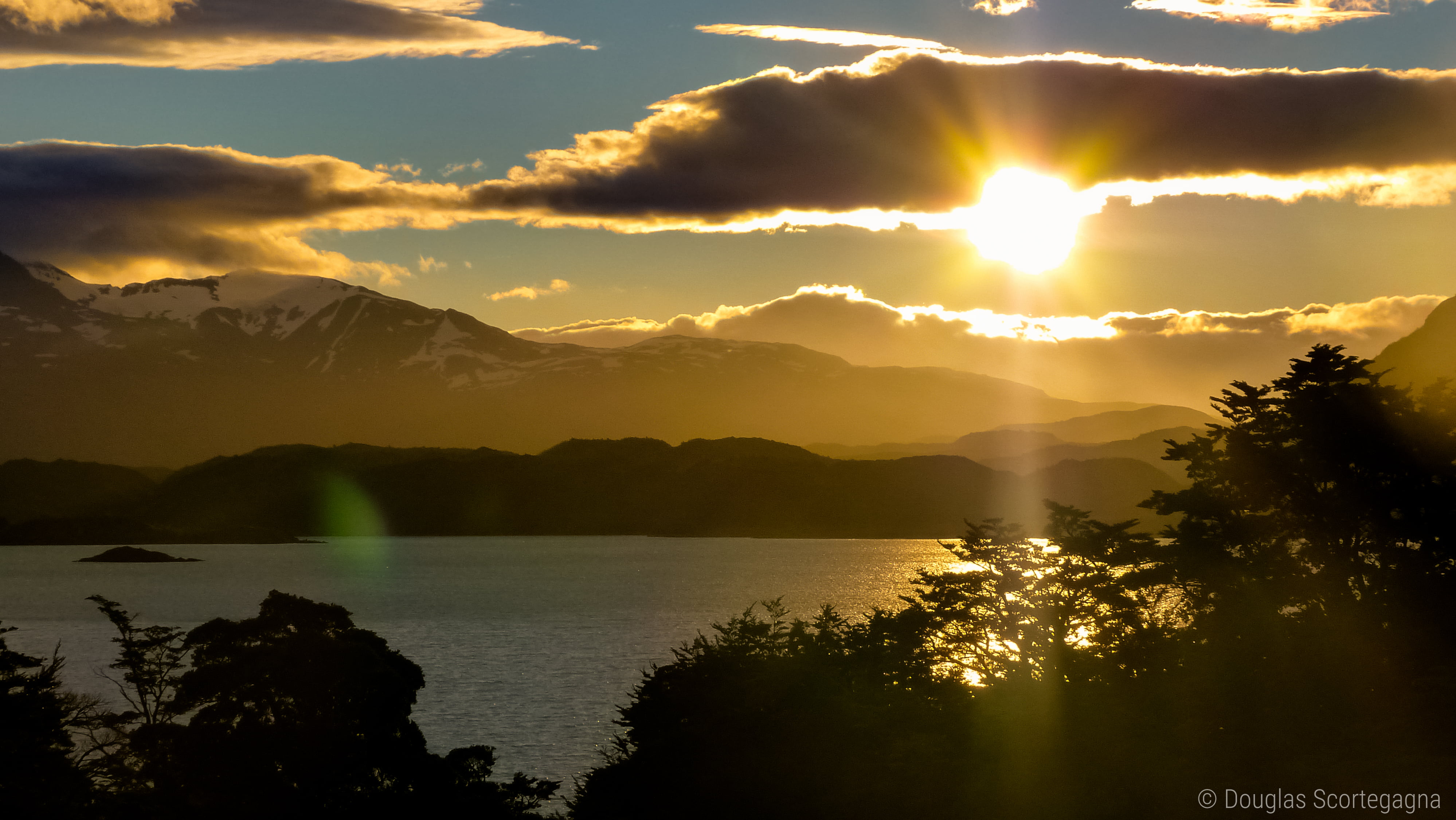 trees and mountains silhouette during golden hour Sunset Patagonia 2k 4k