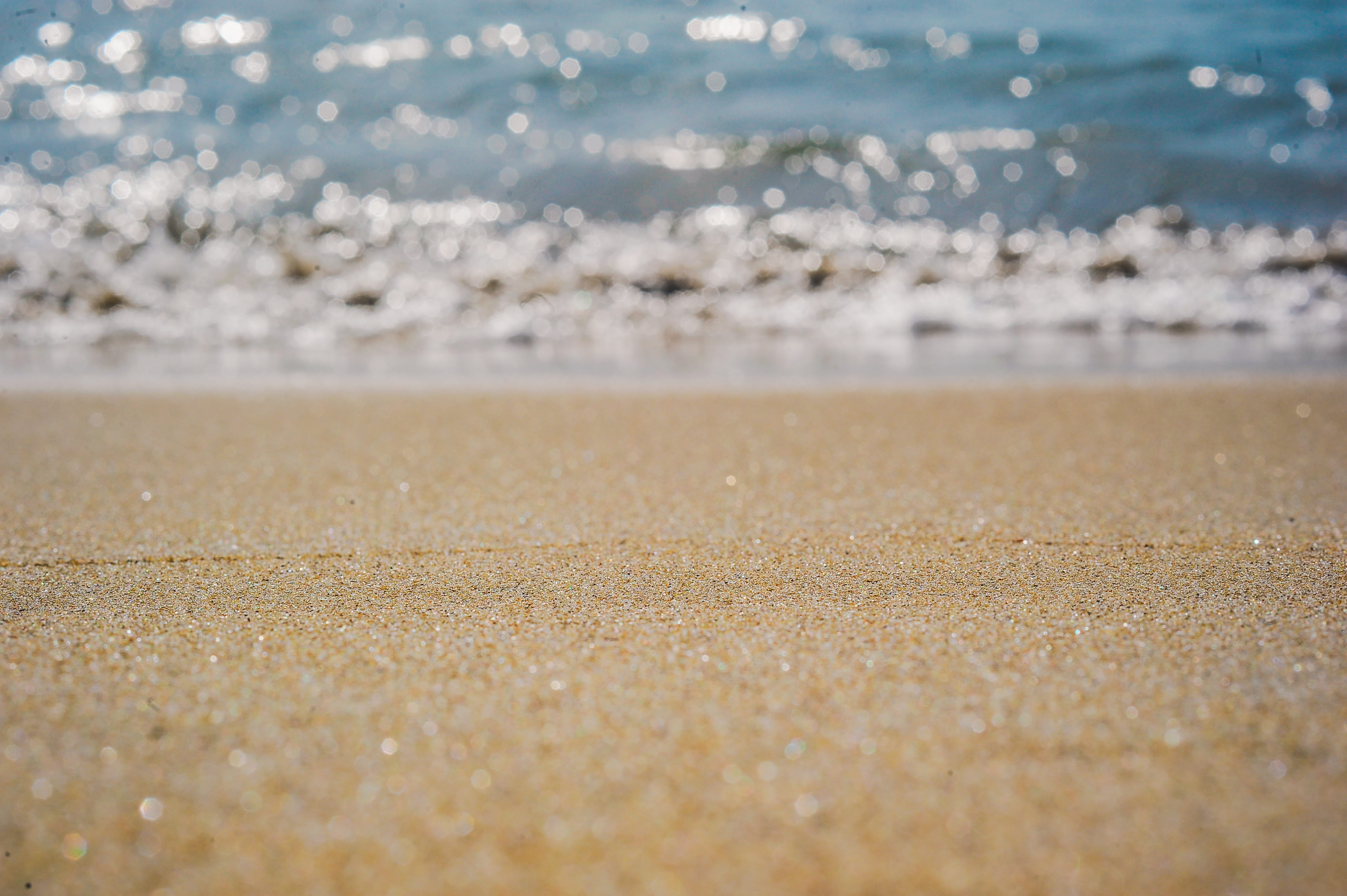 Close Up Photography of Sand wallpaper beach blur depth field 2k 4k