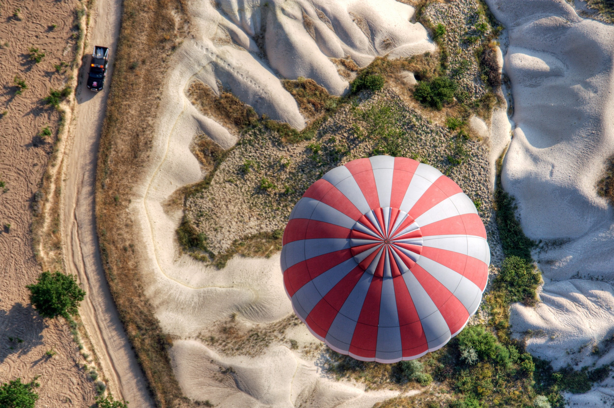 white and red hot air balloon landscape aerial view nature 2k