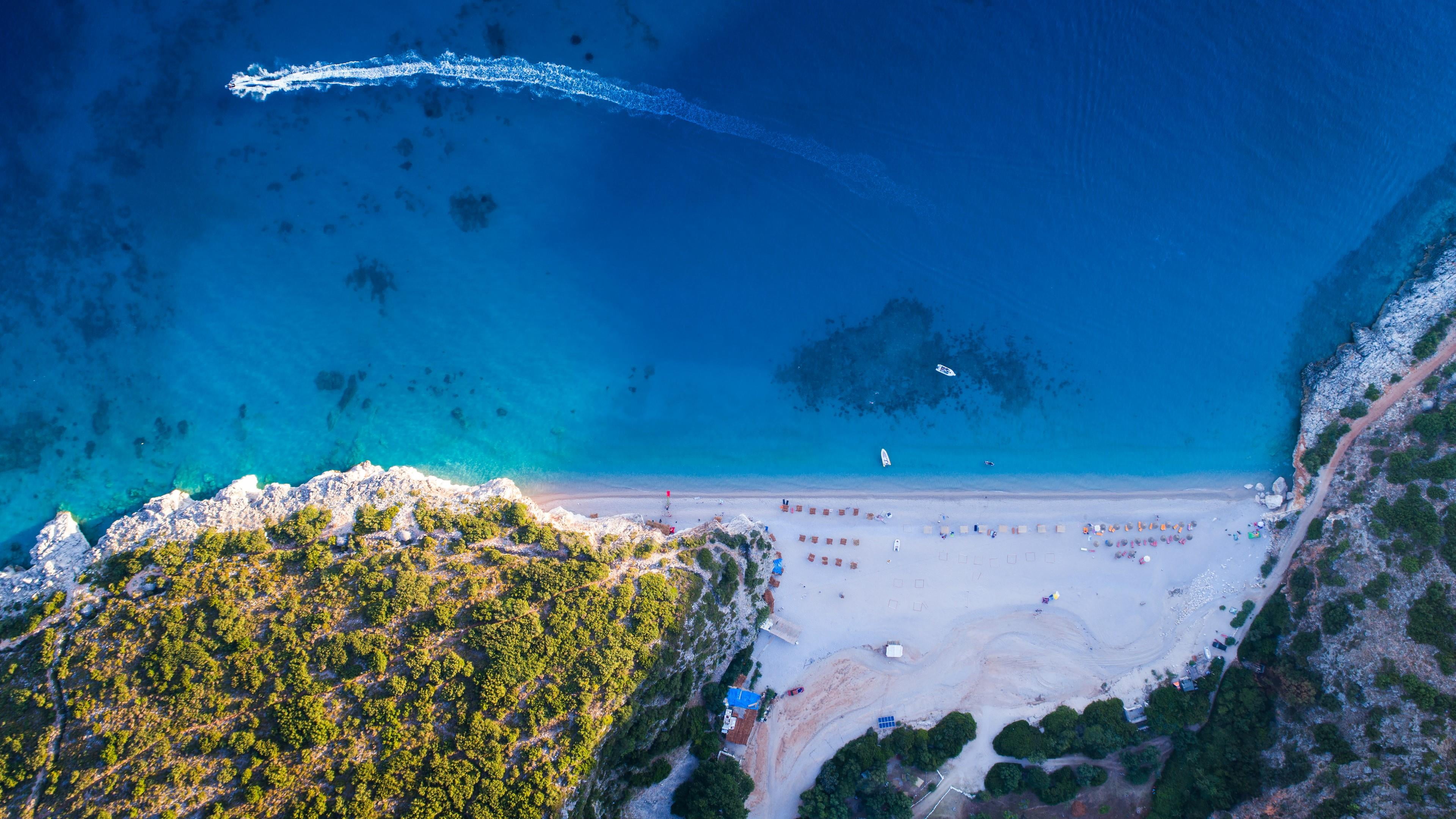 beach sea water sky shore blue ionian azure 2k 4k