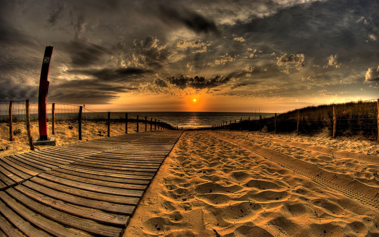 Sunsets Ocean Beach Sand Wooden Walkway Sky Dark Clouds Desktop Hd Wallpaper For Pc Tablet And Mobile 2k 4k