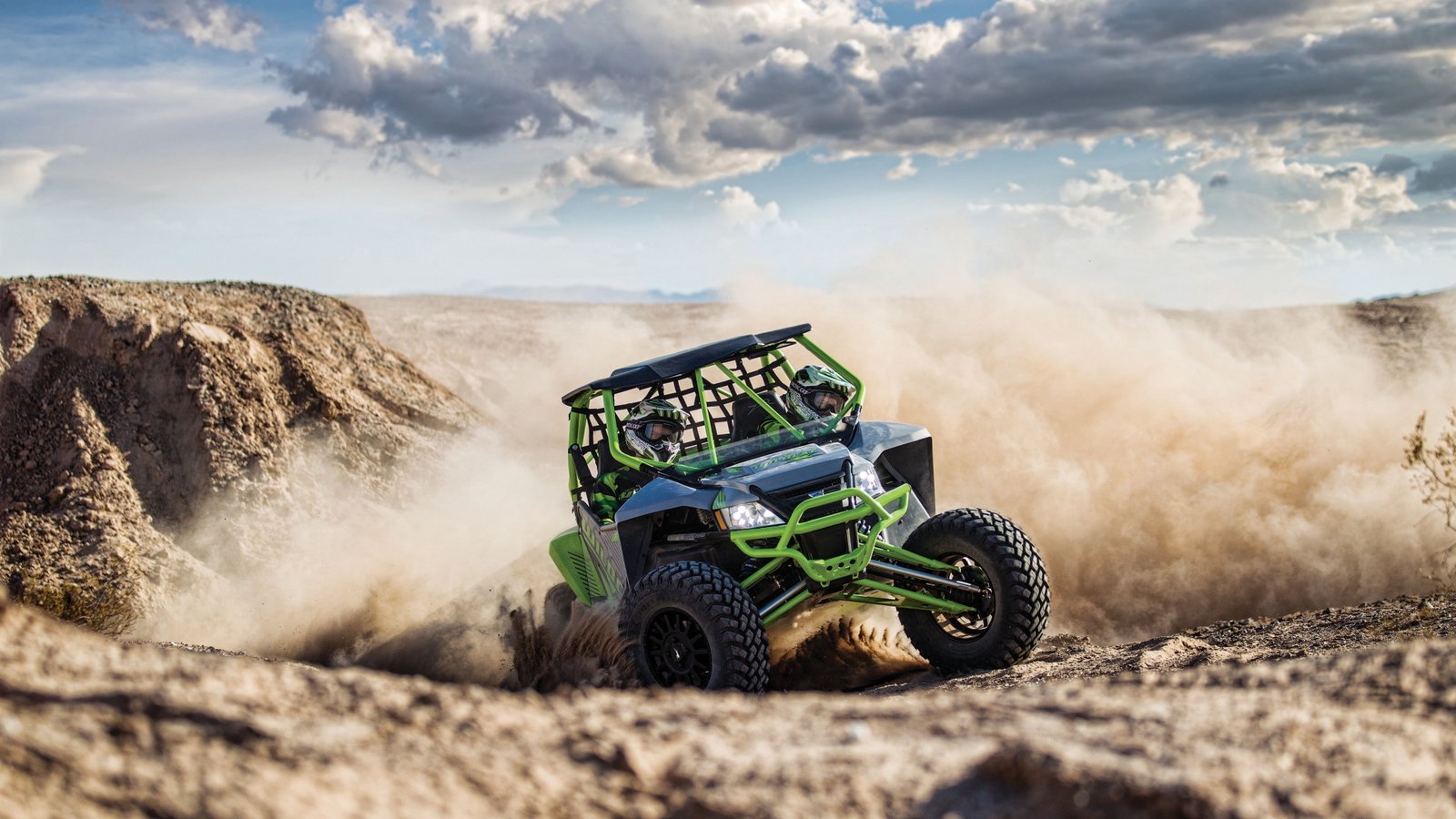 time lapse photography of men riding monster truck on field Arctic cat wildcat 2k 4k
