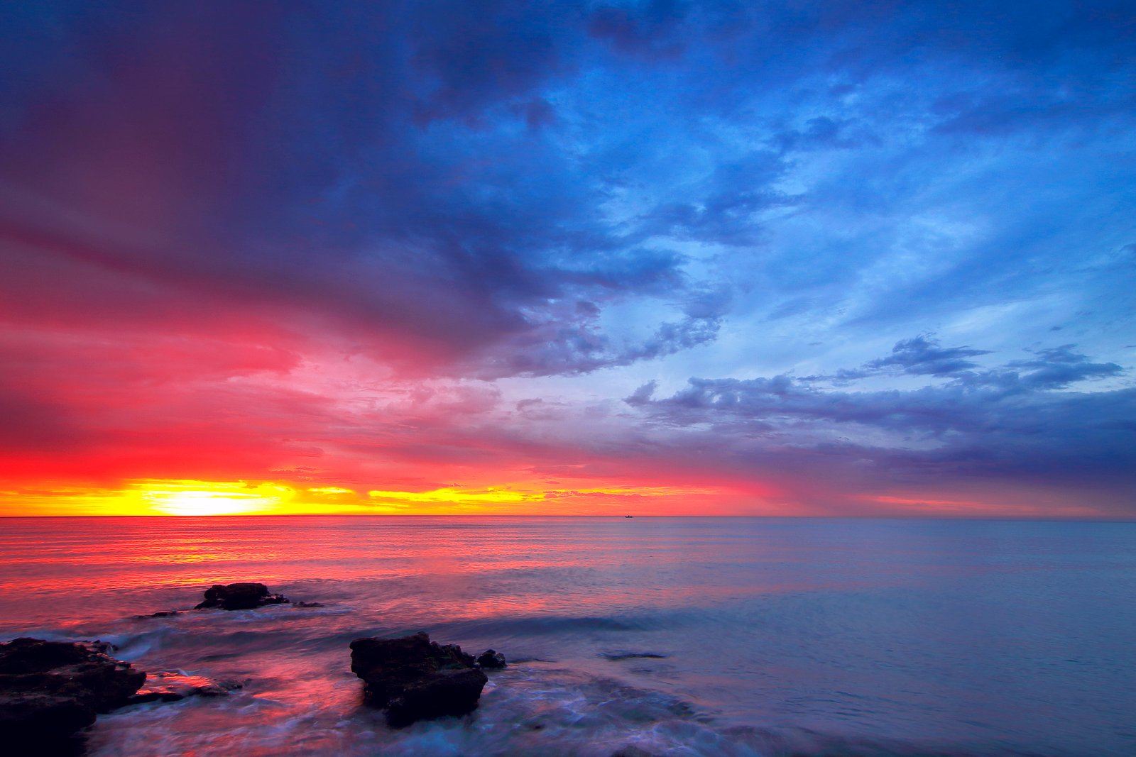 calm sea with rocks during golden hour nature outdoors dawn 2k 4k 5k