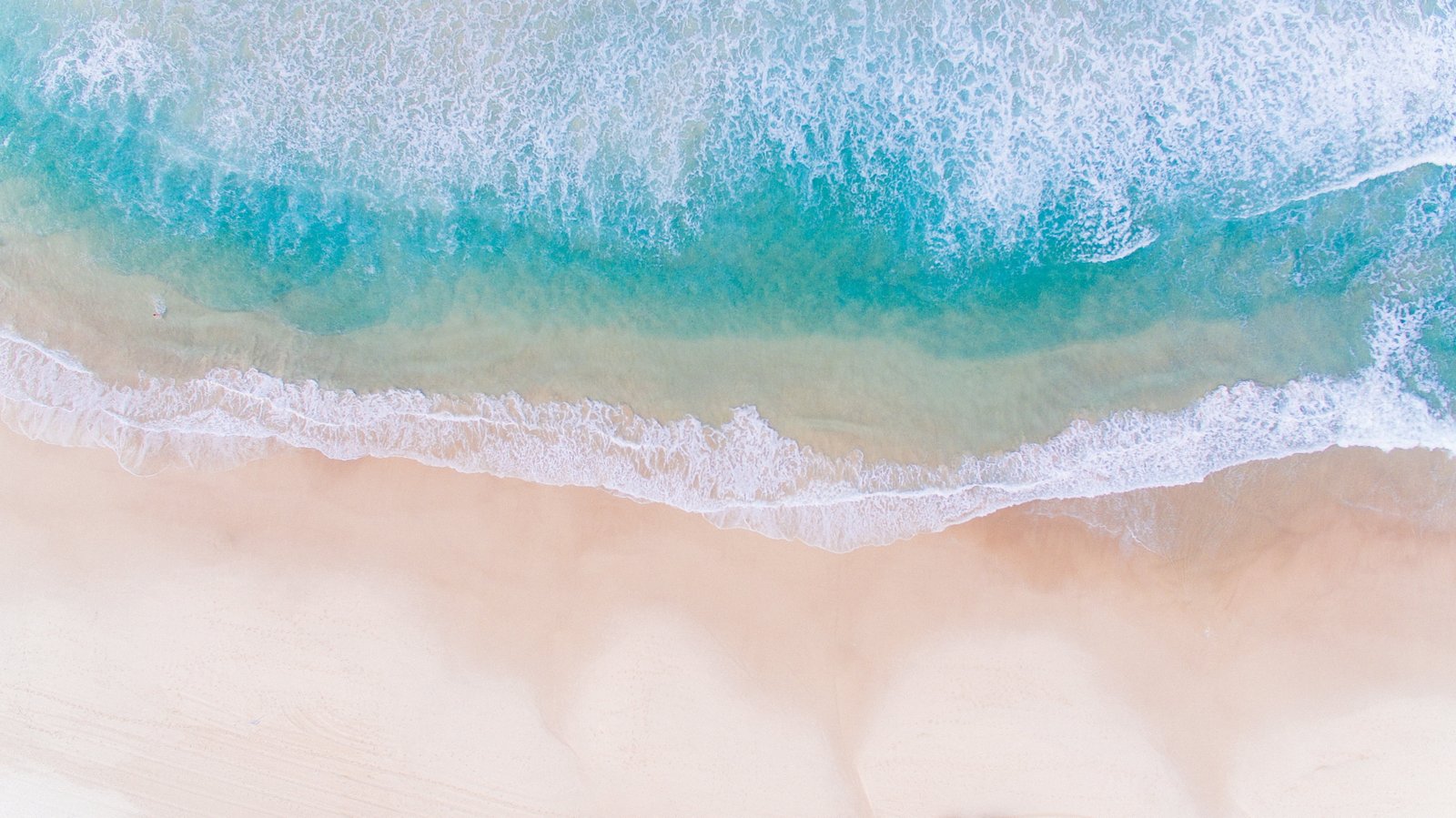 high angle photography of shoreline sea ocean water waves 2k 4k