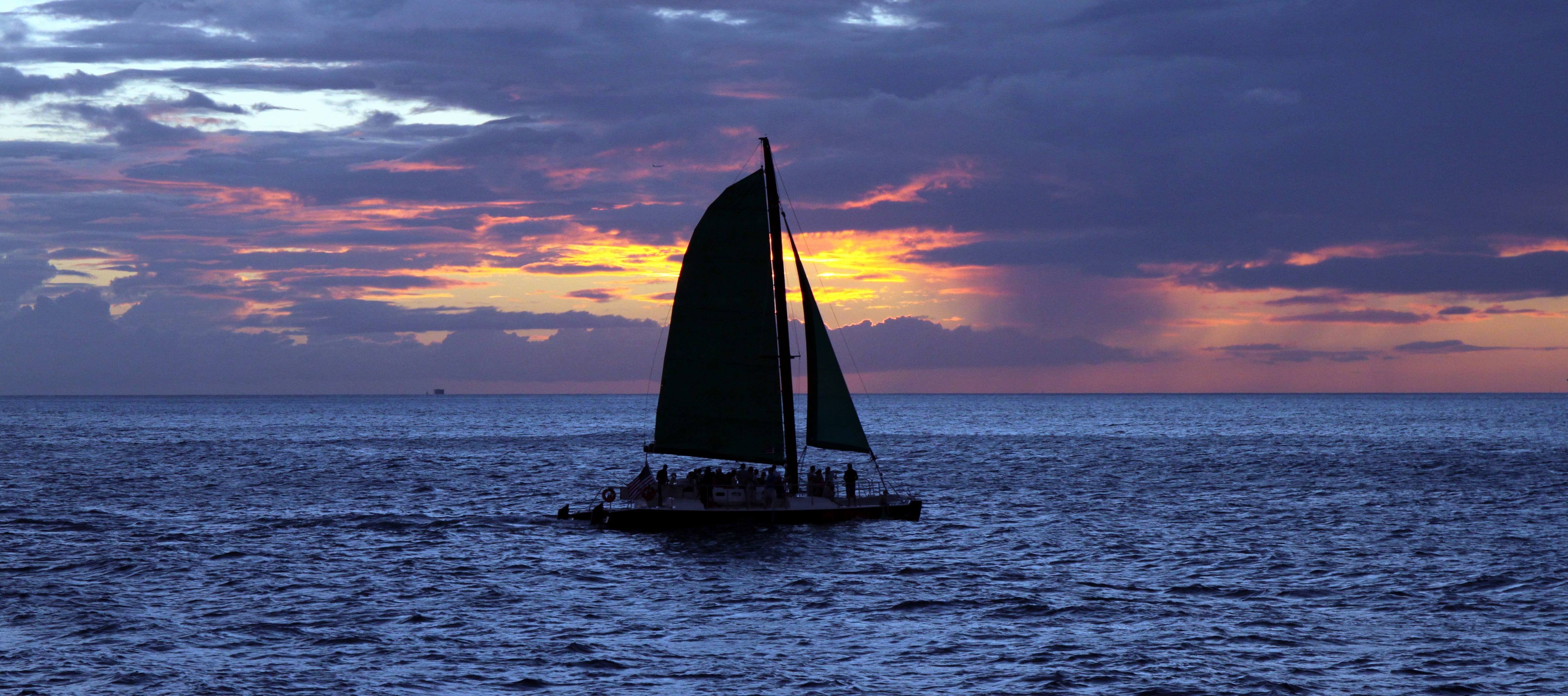silhouette of boat on body water during sunset Sailing sail 2k 4k 5k