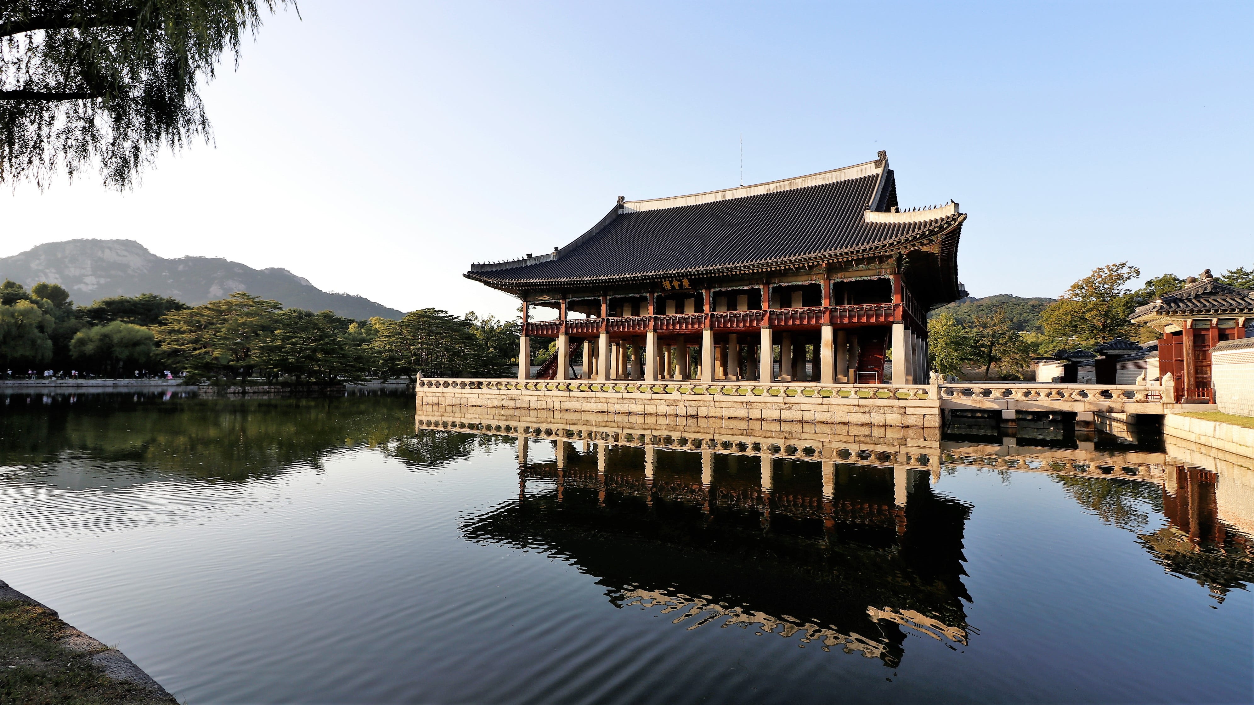 temple with body of water gyeongbok palace gyeonghoeru forbidden city 2k 4k
