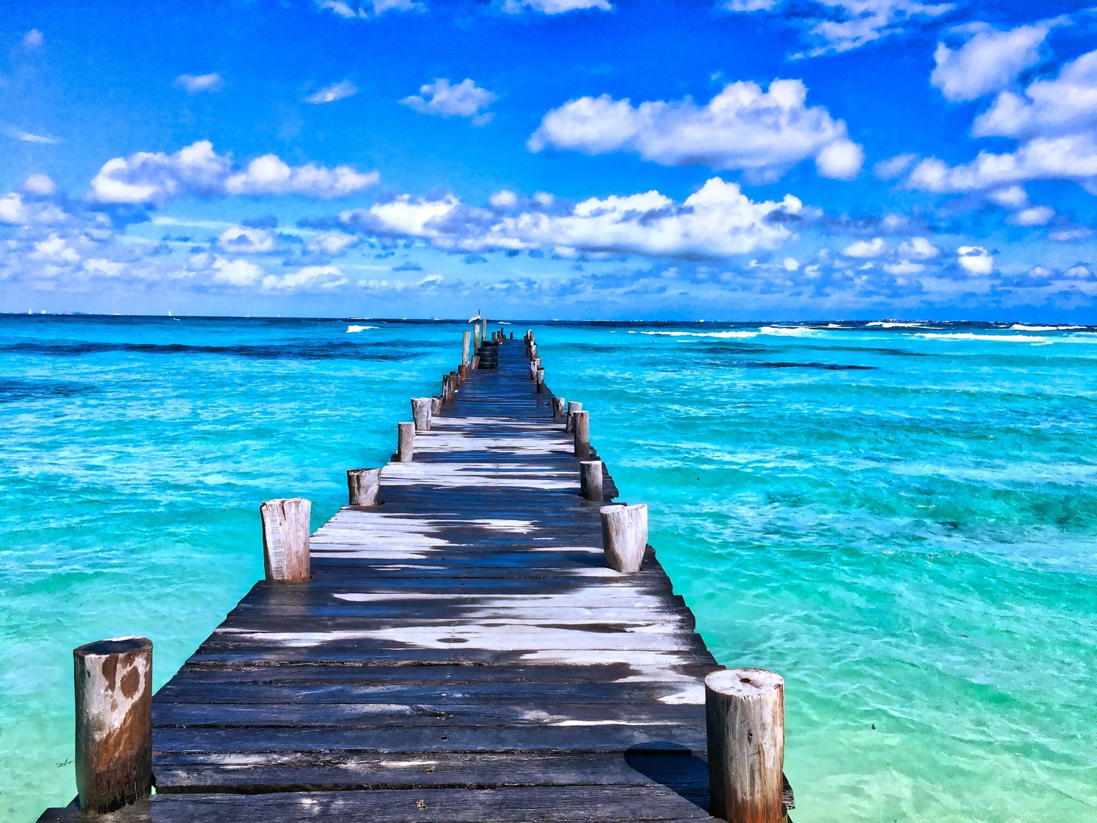 Brown Wooden Dock Across Clear Ocean beach beautiful bridge 2k 4k